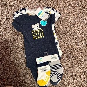Brand new for new born socks and onezee’s